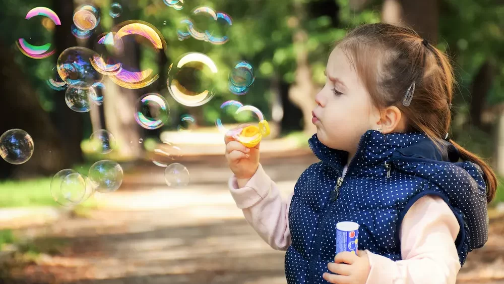 Kid Blowing Bubbles