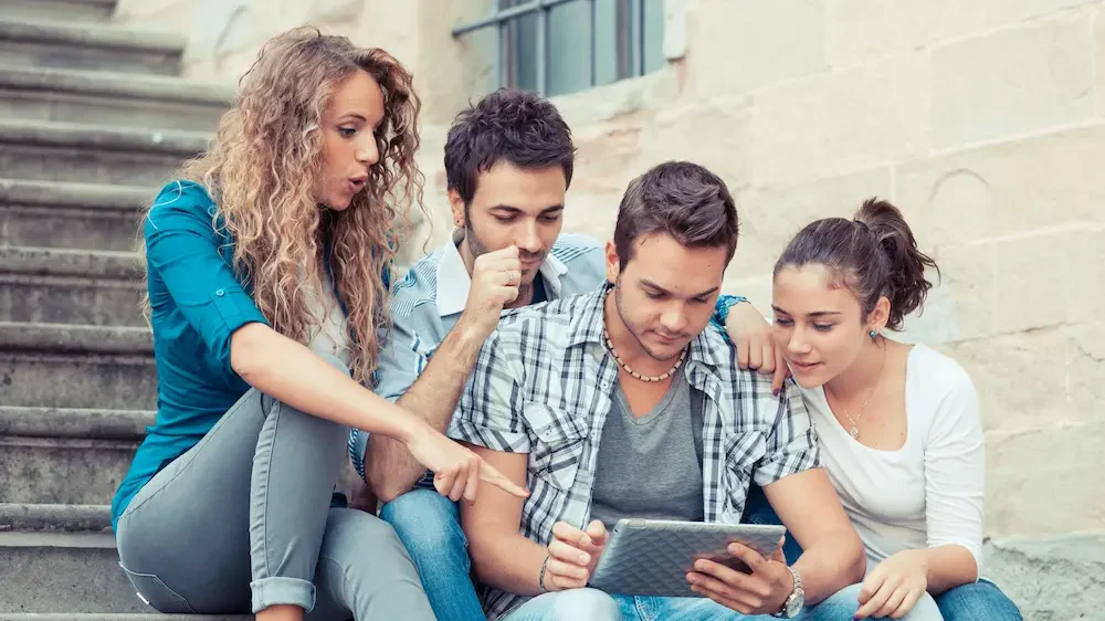 Group of Friends with Tablet PC