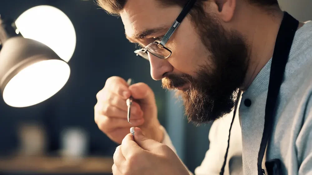 Jeweler working in workshop