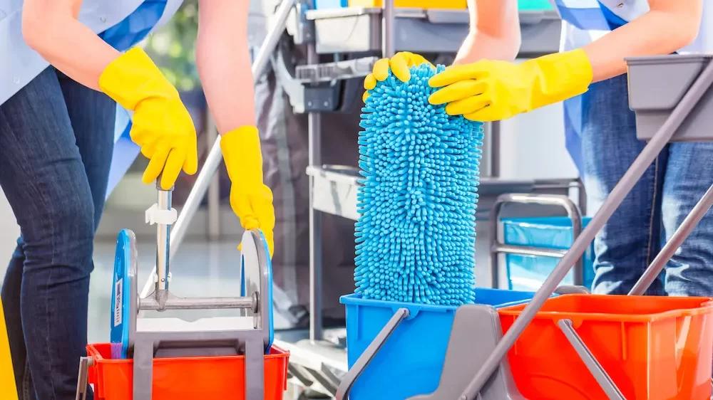 Cleaning ladies mopping floor