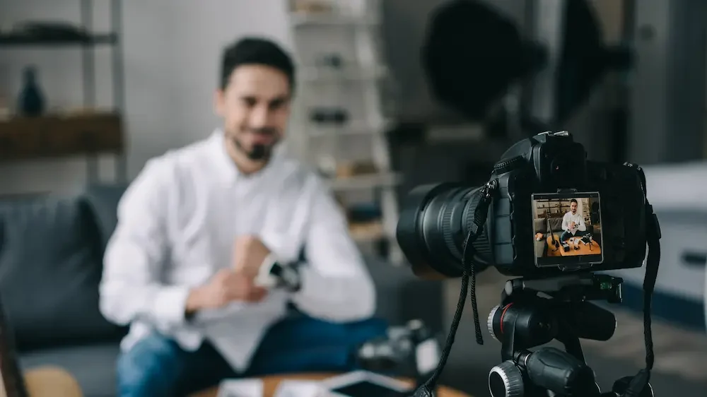 Technology blogger wearing new smart watch while recording a video