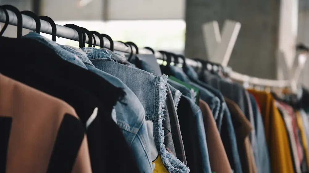 Women clothing on hangers in a boutique store