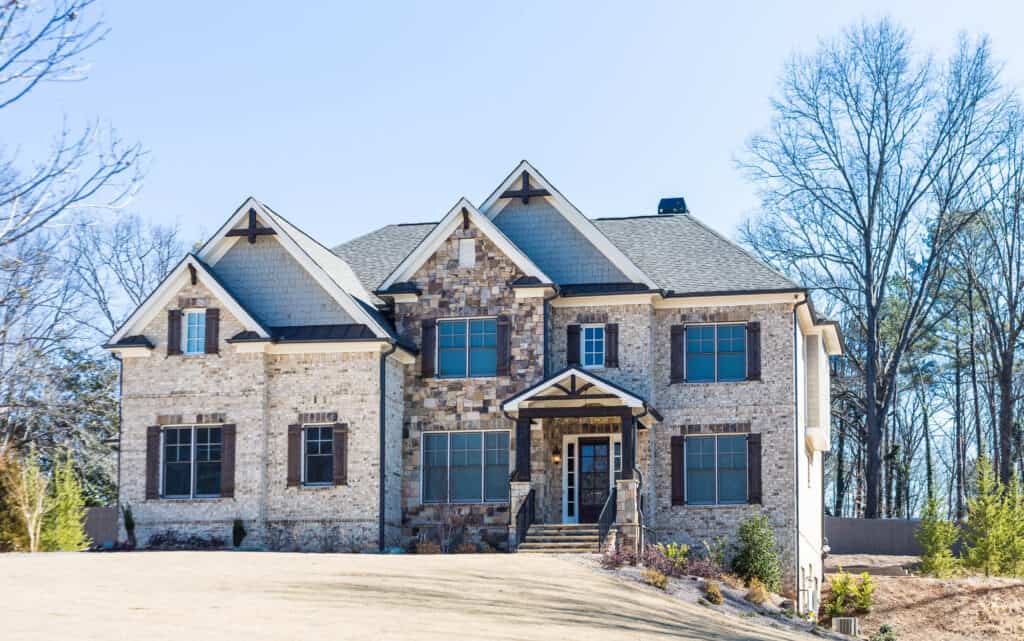 Brown Brick and Stone House in Winter