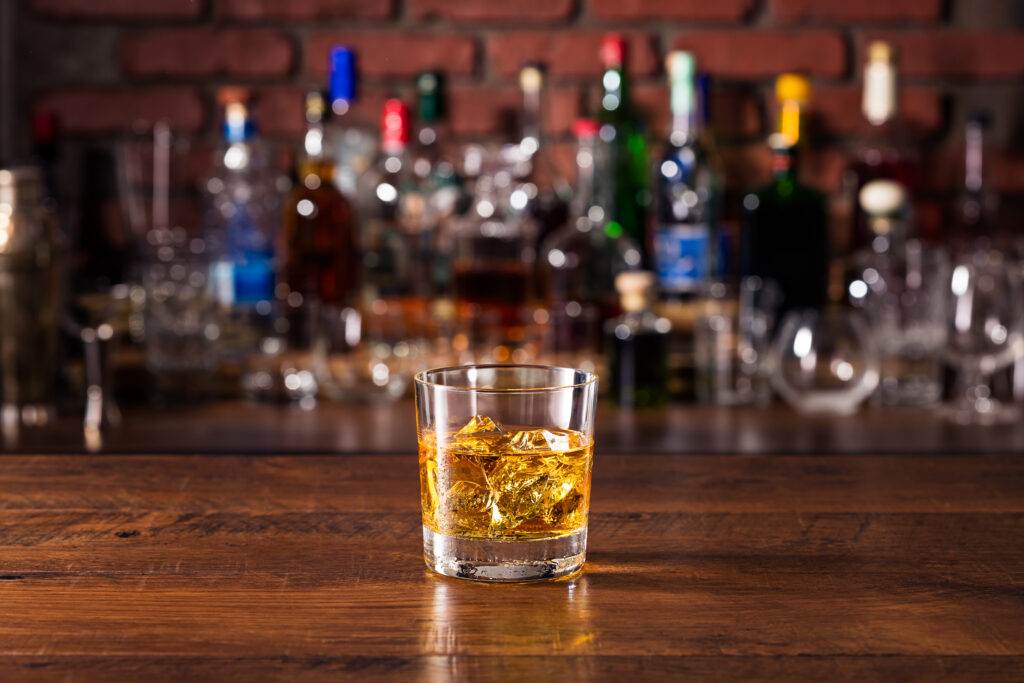 Refreshing Whiskey Rocks Cocktail on a Bar