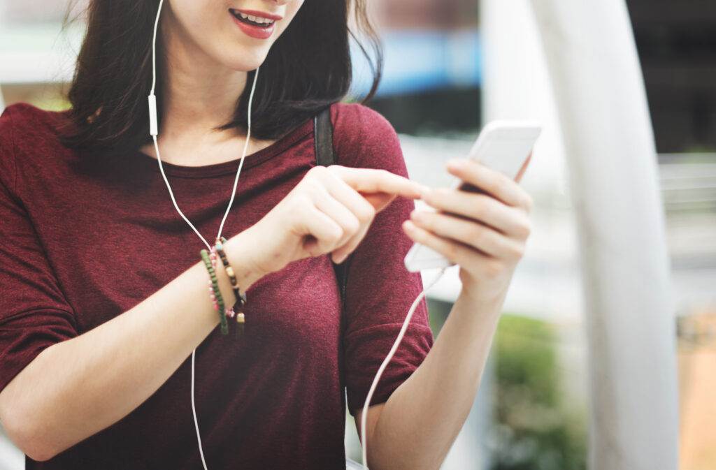 Woman Listening Music Media Entertainment Walking Concept