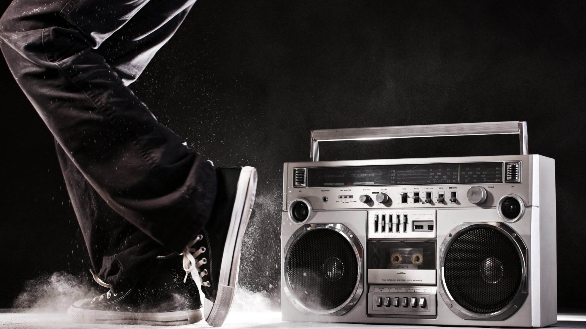 Retro ghetto blaster, dust and dancer isolated on black background with clipping path