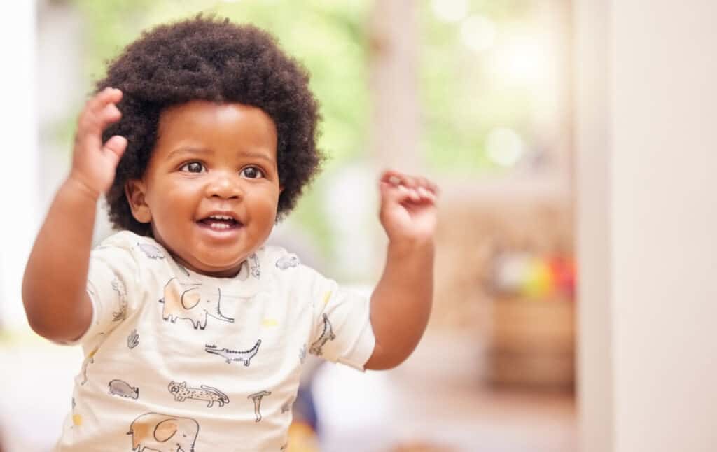 It feels a lot like playtime. Shot of a cute baby playing at home
