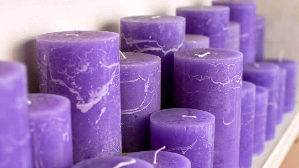 Varied violet candles in a interior decorating store
