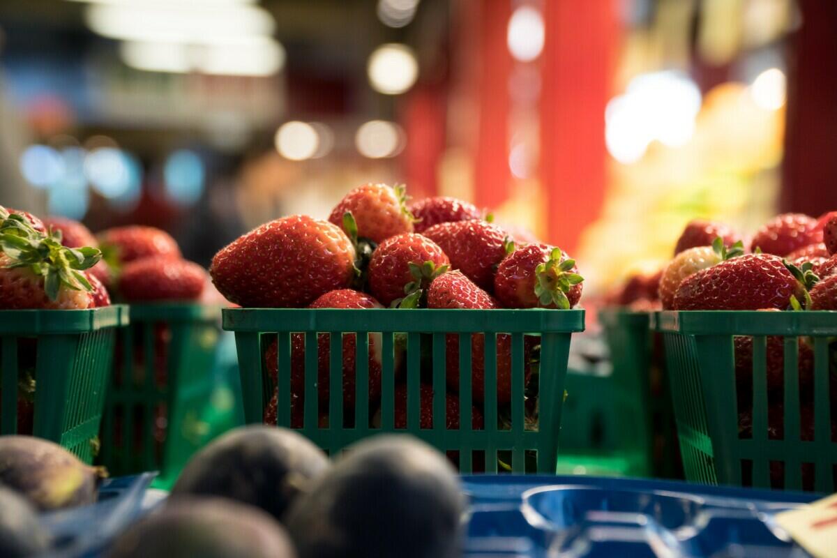 Red Strawberries on Green Plastic Basket